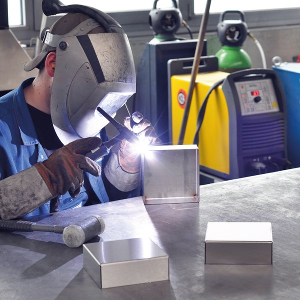 Lassen met E-Weld anti-spat